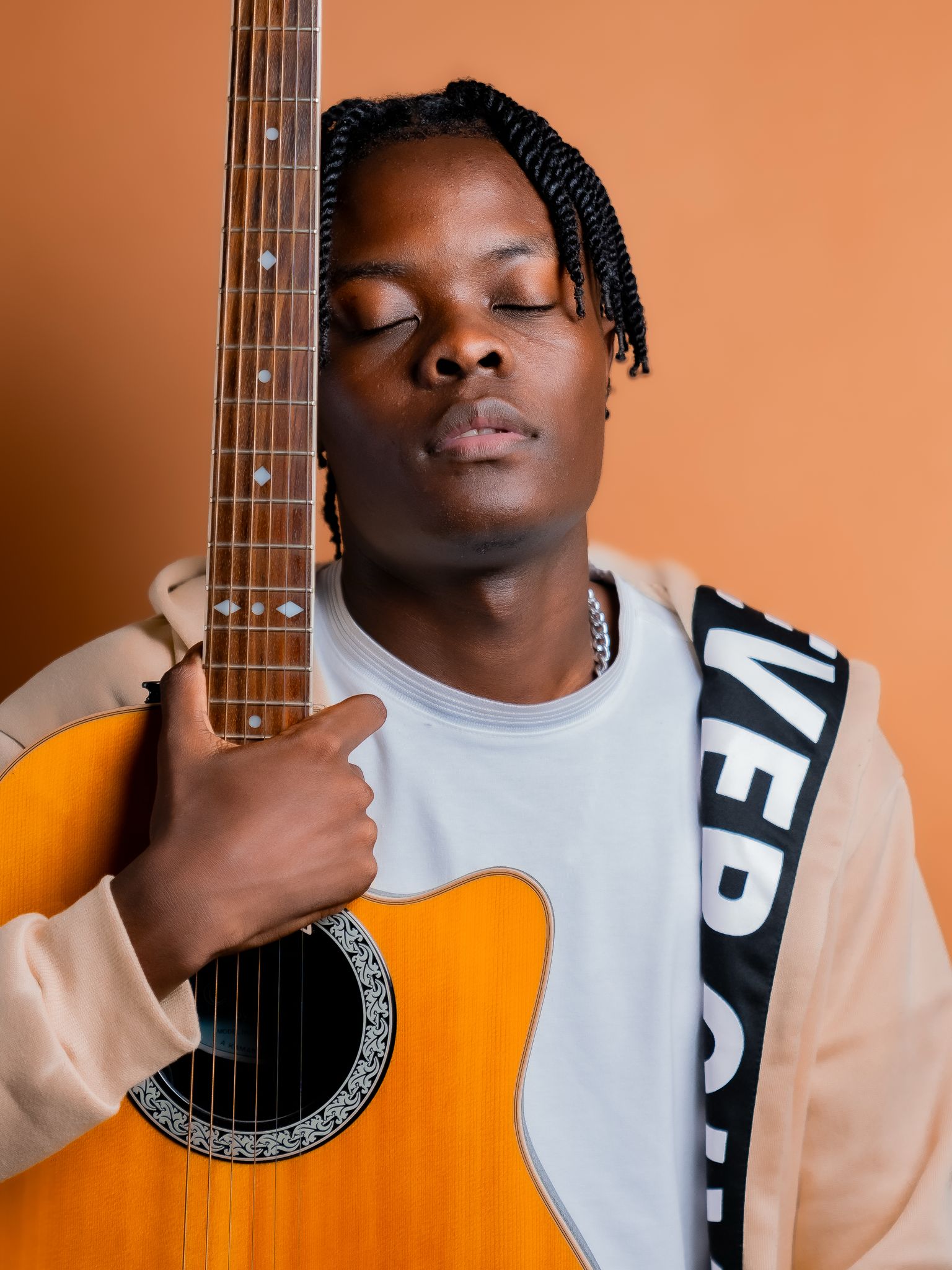 ZEEY with acoustic guitar