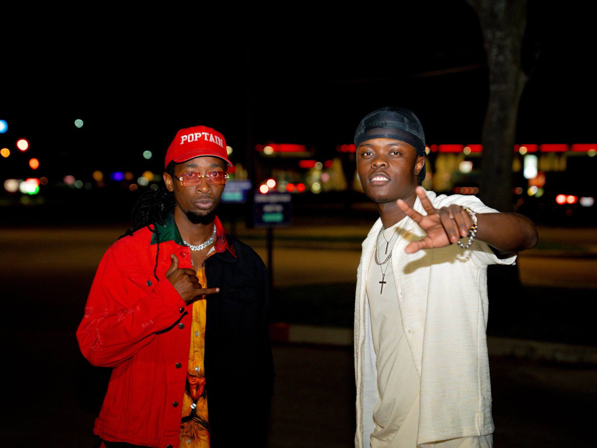 Zeey with another artist at night